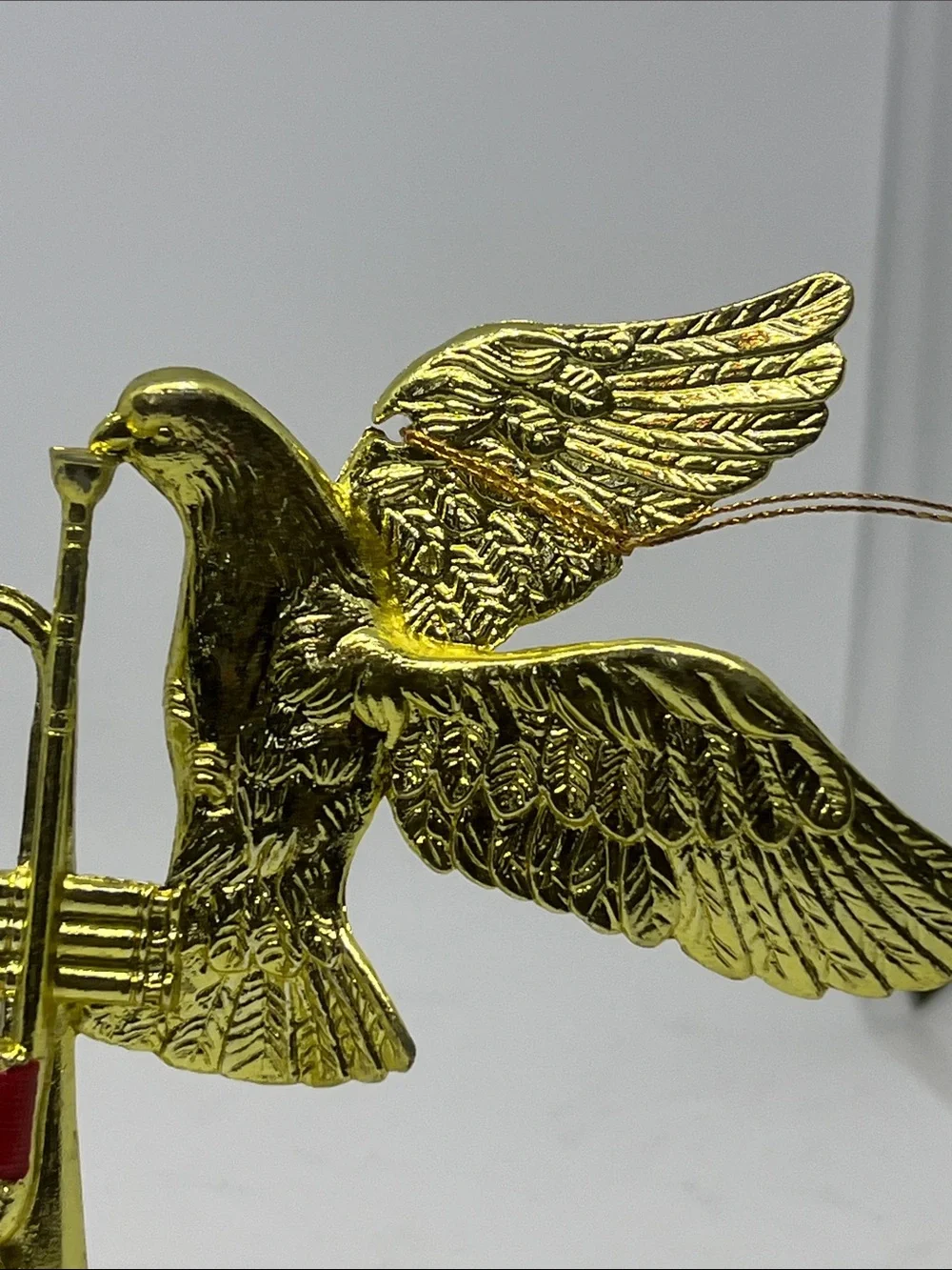 Vintage Gold Flying Dove with Trumpet Holiday Ornament with Red Bow